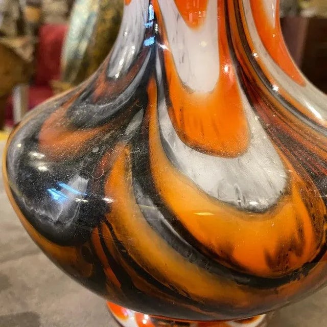 An opaline glass vase made in Italy in the Seventies. Orange and gray colors are typical of the period. It's in perfect...