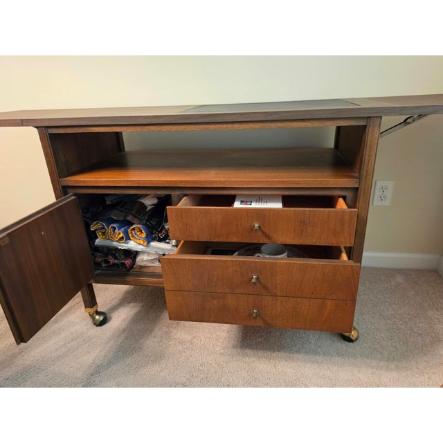 Mid-century modern Basic Witz brand rolling drop leaf bar cart. If you love this pattern, I have the matching hutch with...