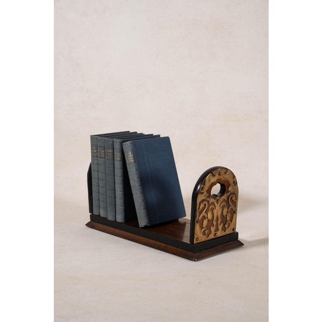 Victorian rosewood book slide with adjustable ends, brass detailing, and rich figured grain. Designed to support books...