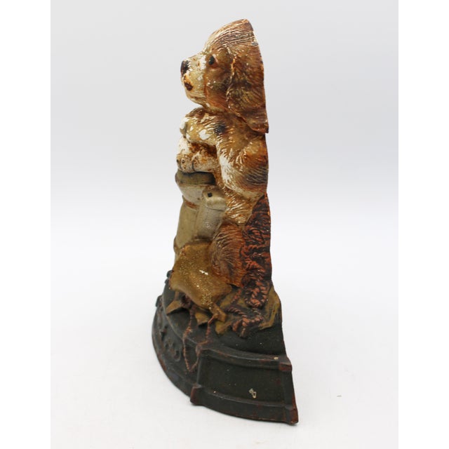 Circa 1900 cast iron & painted dog doorstop, English. Adorable! Resting his paws on a coffee pot. Great worn paint. 8...
