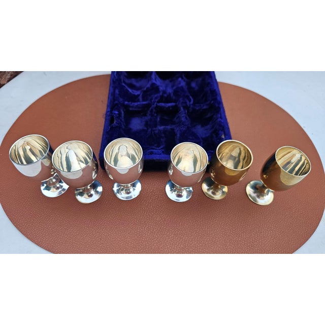 EPNS plated goblets in a box, 1960s. Box dimensions: height 6 cm, width 17 cm, depth 19 cm. Glass dimensions: height 7.7...