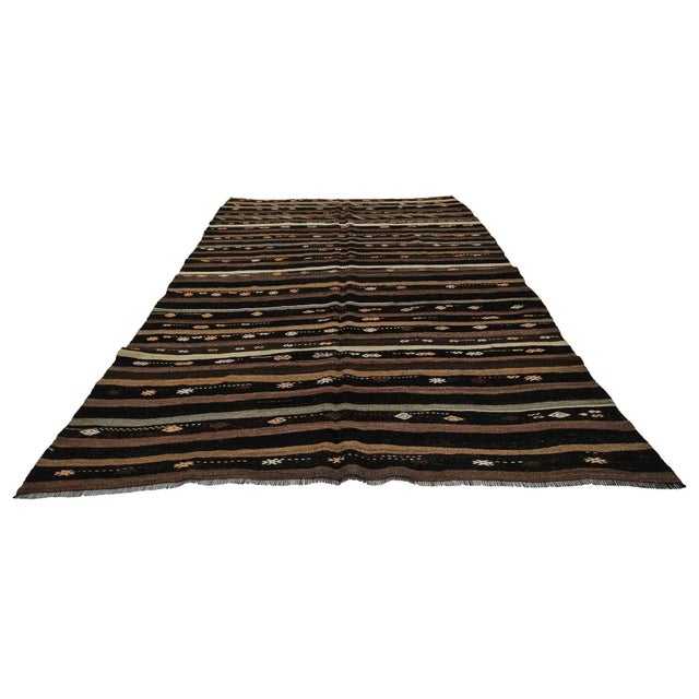 Handwoven vintage kilim rug from Afyon region of Turkey. Approximately 50-60 years old. In very good condition.