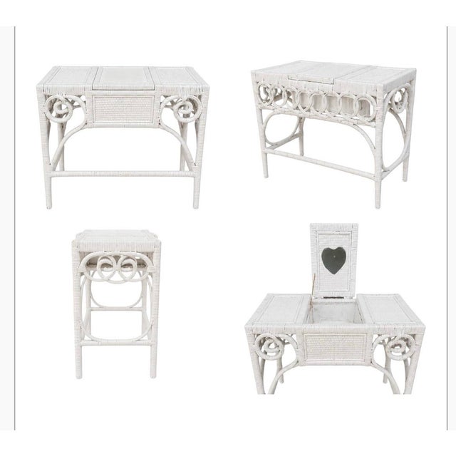 Embrace the nostalgic romance of 1980s coastal glamour with this exquisite Palm Beach Style White Child’s Wicker Vanity...