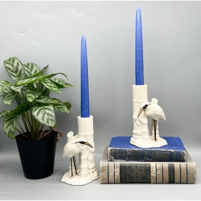 Beautiful, early pair of Fitz & Floyd crane candlesticks made in Japan and dated 1977 on the underside. These sculptural...
