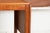 A danish midcentury teak dining table by vejle stole, produced during the 1970s with a clean-lined architectural form...