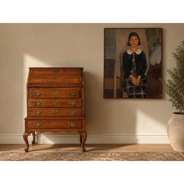 Elegant vintage Queen Anne-style secretary desk crafted from solid cherry wood with a warm, beautifully aged finish. The...