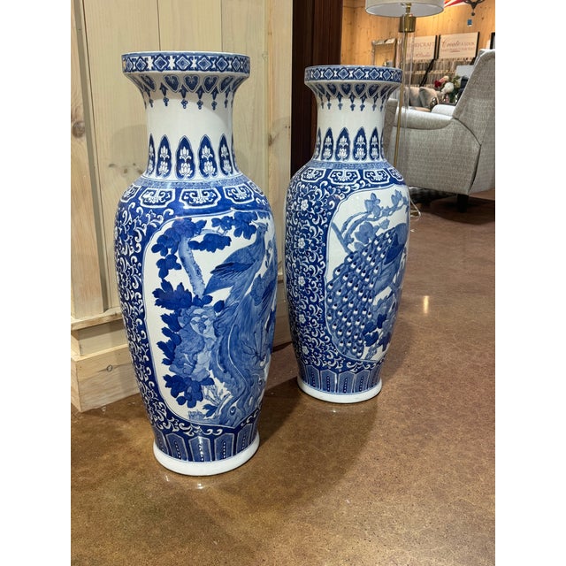 A pair of vintage blue & white ceramic vases. In excellent condition.