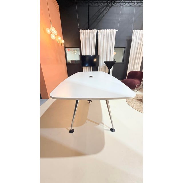 Vitra conference table. Wood materials with a melamine resin surface coating are robust and durable.