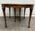 This is a beautiful vintage Queen Anne / Early American style oval dining table in solid cherry or cherry veneer with warm...