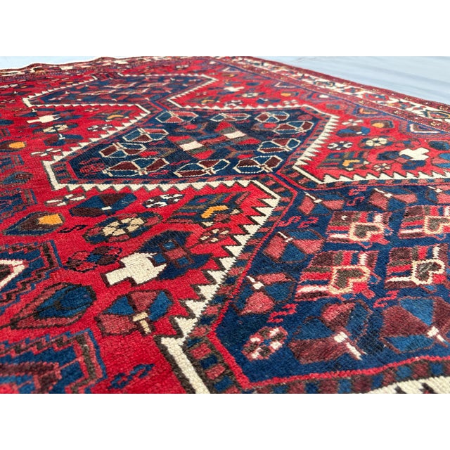 This Vintage rug would make a beautiful decor addition to your house. This is composed of 100% wool and is carefully hand-...