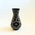 A mid century West German Pottery vase by Carstens. Textured geometric design in contrasting black and matte gray glazes....