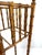 A finely crafted early 20th century plant stand rendered in turned wood to imitate bamboo, a popular design motif of the...