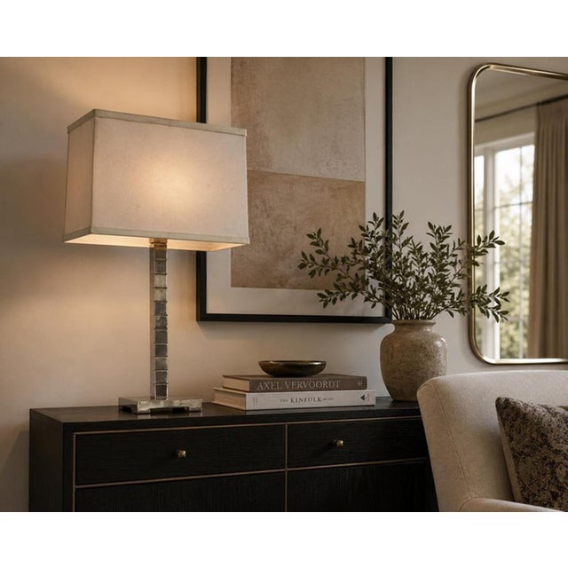 Designed and manufactured by Marian Jamieson in the United States, this elegant "Cube" table lamp showcases the designer's...