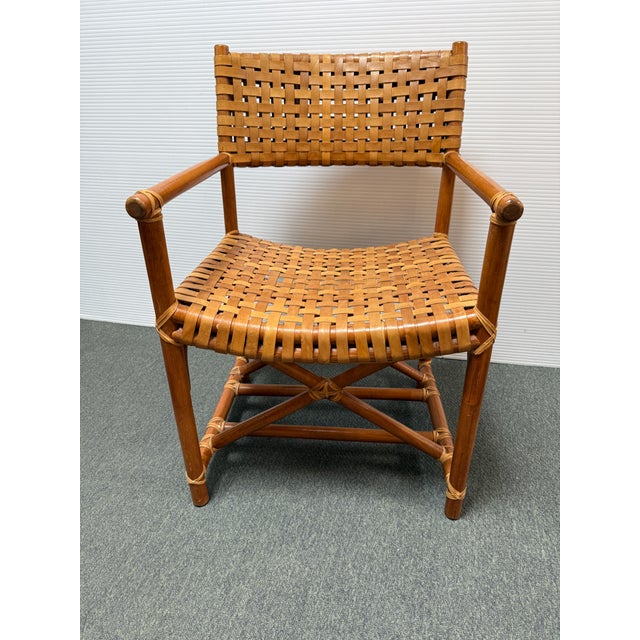 Design Plus Gallery presents a Safari Chair in the Style of McGuire. The chair has latticed strips of leather that create...