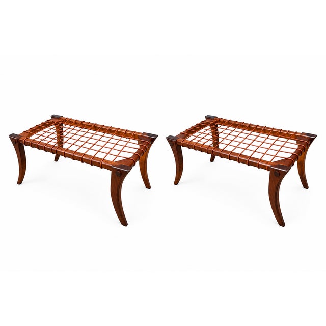 Robsjohn Gibbings style ottoman. The ottomans are in good condition. The solid walnut ottomans Are done in a natural satin...