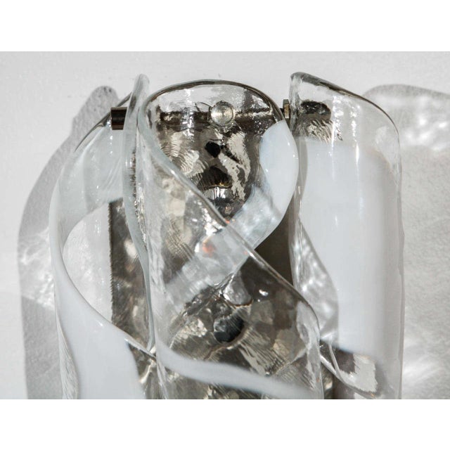 Single Murano sconce newly rewired for a bulb up to 125 watts. Three sconces available.