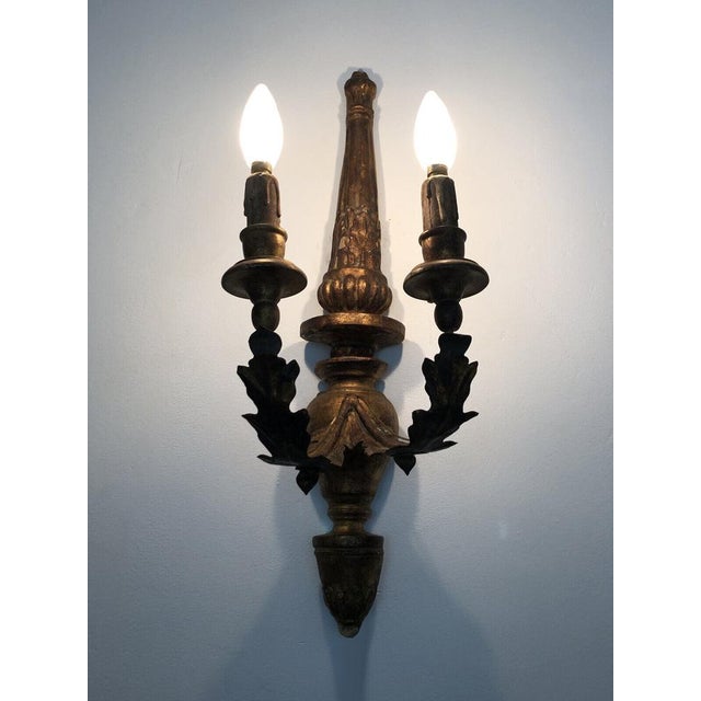 Very large pair of vintage italian wall lights in gilded wood and metal arms superb pair of italian wooden wall lights....