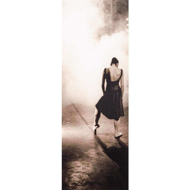 A contemporary fine art photography print in sepia tones depicting an elegant ballerina dancer. Signed "Stoddart" in the...