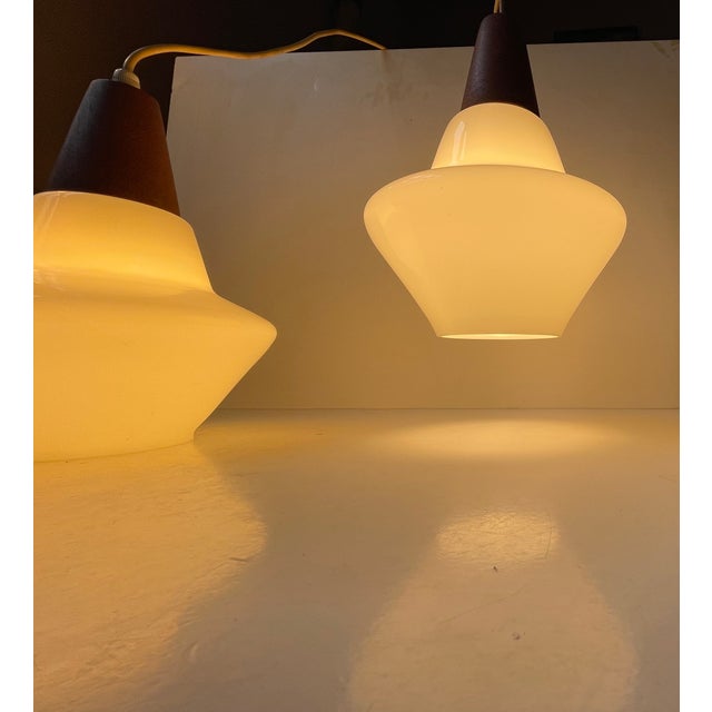 1960s Danish Modern White Opaline Glass and Teak Pendant Lamps by Holmegaard, 1960s, Set of 2 For Sale - Image 5 of 11