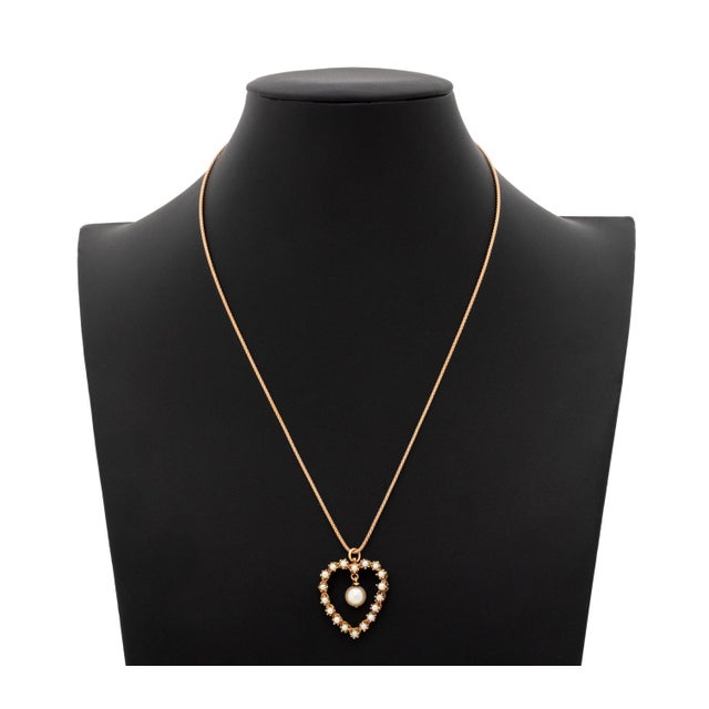 14K Gold and Pearl Heart Form Pendant on 10K Rose Gold Necklace, featuring one detachable pendant decorated with 18 prong...