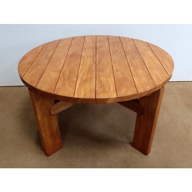 Round table attributed to Maison Regain, a French company specializing in furniture design from 1960 to 1980. Its...