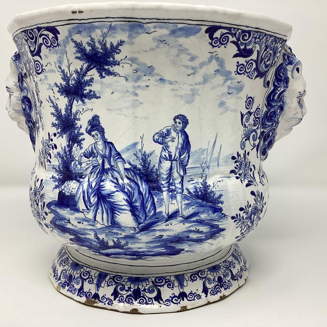 Beautifully detailed with figural lion’s heads on the side. Marked I.D.A., 762, 48, on base. The trademark I.D.A. Was...