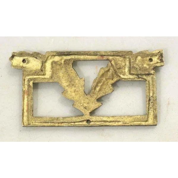This antique brass decorative plate can be used as an accent place on drawers and or file cabinet. Priced each.