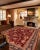 "Enhance the ambiance of your home with this magnificent Persian-influenced Turkish hand-knotted rug made by skilled...