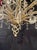 Circa 1940's silver leaf finish 12 lights chandelier with beaded crystals and cut crystal body
