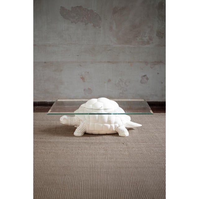 Turtle-shaped storage coffee table product details turtle-shaped base with beveled glass top. turtle dimensions: 110 w x...