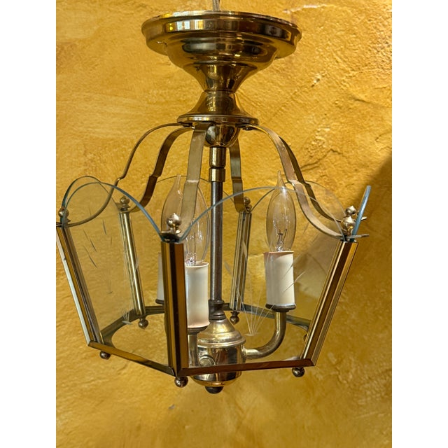 A very well kept 6 sided brass and glass fixture. Delicate cattail etching on each glass piece. 11” tall and 7” across the...