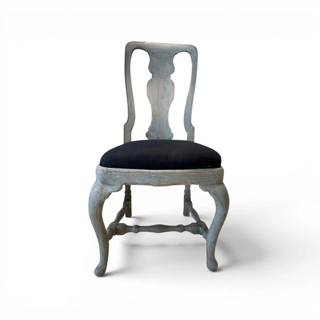 This exceptional set of eight 18th-century Swedish Rococo chairs showcases the graceful curves, elegant carvings, and...