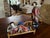 A striking pair of vintage Chinese porcelain court lady figures, beautifully modeled and richly decorated in vibrant...