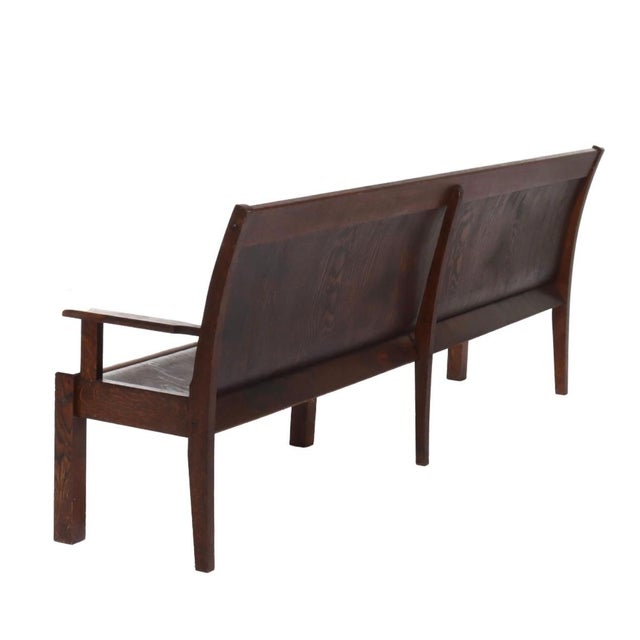 An example of early 20th-century craftsmanship, this 8-foot bench hails from the Arts & Crafts movement, circa 1920....