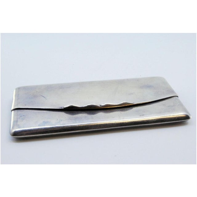 Envelope-Shaped Silver Cardboard Box with Hinged Lid, in Very Good conditions. Designed 1890 to 1919 This piece has an...