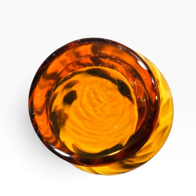 Bring warm, glowing amber tones and classic Italian craftsmanship to your shelf styling or tabletop with this vintage...