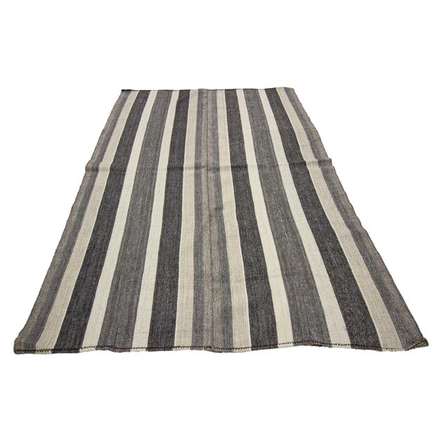 Modern vintage handwoven kilim rug from Adana region of Turkey. Approximately 50-60 years old. In very good condition