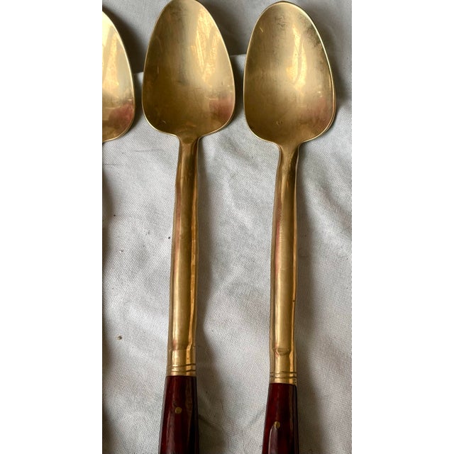 This is a beautiful set of nicely shaped iced tea spoons made of brass with rosewood handles. They would be a great...
