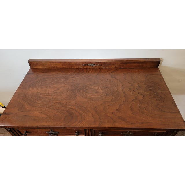 Antique Mahogany desk from the 1920s. Two drawers well build and ready for use. Large area for a chair too. Made in...