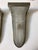 Stunning pair of French Art Deco wall sconces. With clear frosted glass shades with intricate geometric motif. Held by...