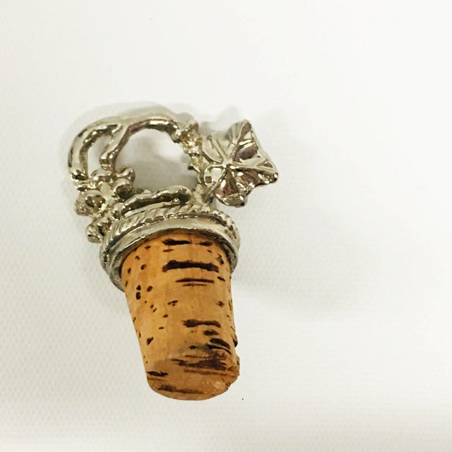 Plated Silver Grape Cluster wine Bottle Stopper with cork. The time period/ date of manufacture cannot be determined,...