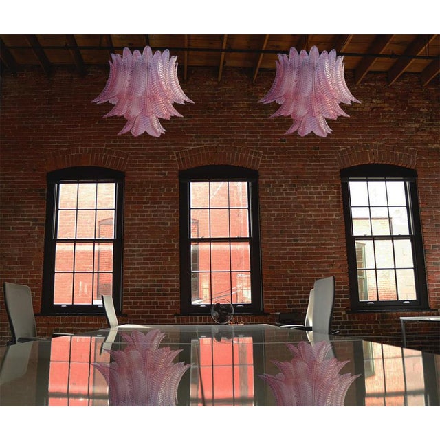 Pair Beautiful and huge Italian Murano Chandeliers composed of 48 splendid pink glasses that give a very elegant look. The...