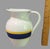 This vintage Italian pottery pitcher is a beautiful addition to any Mid-Century Modern collection. The hand-painted blue...