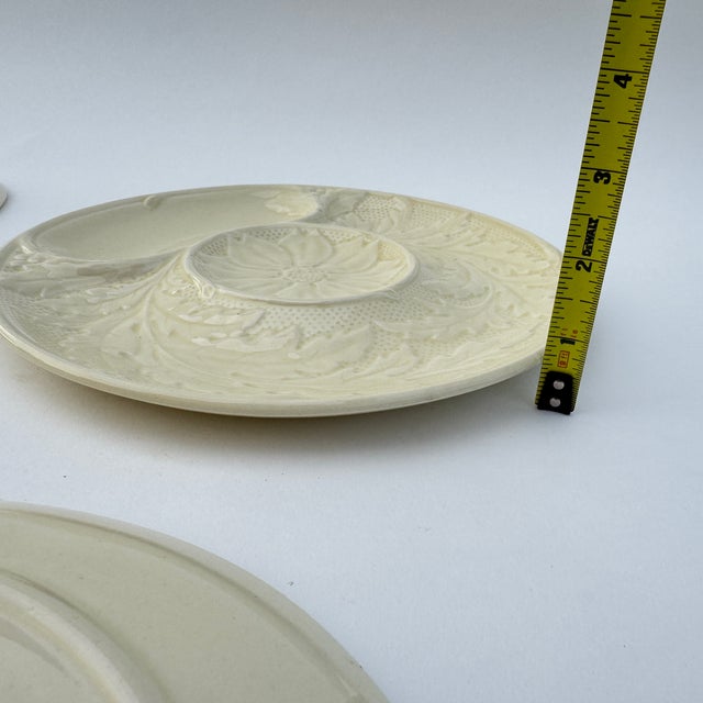 Set of 4 Gien earthenware artichoke plates. Made in France. Dated to sometime in the mid 20th century based on the makers...