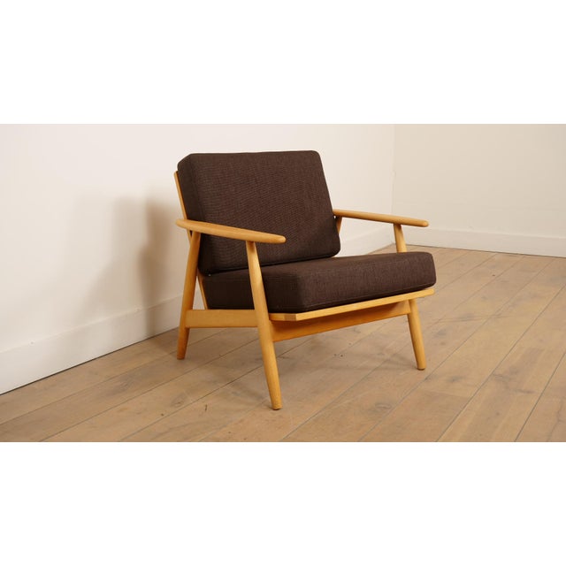 Beautiful vintage Danish armchair, designed in the 1960s, in distinctive Danish style. This stylish armchair is incredibly...