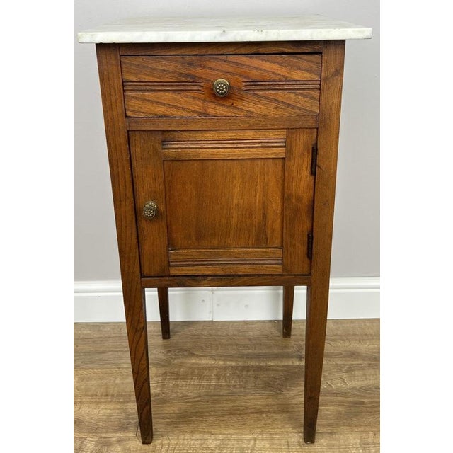 Bring timeless French elegance into your home with this Antique French bedside table , beautifully crafted in oak and...