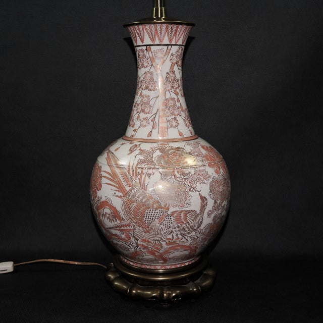 This Chinoiserie or Kutani-style lamp features hand painted iron-red and gilt pheasant birds and flowers across a...
