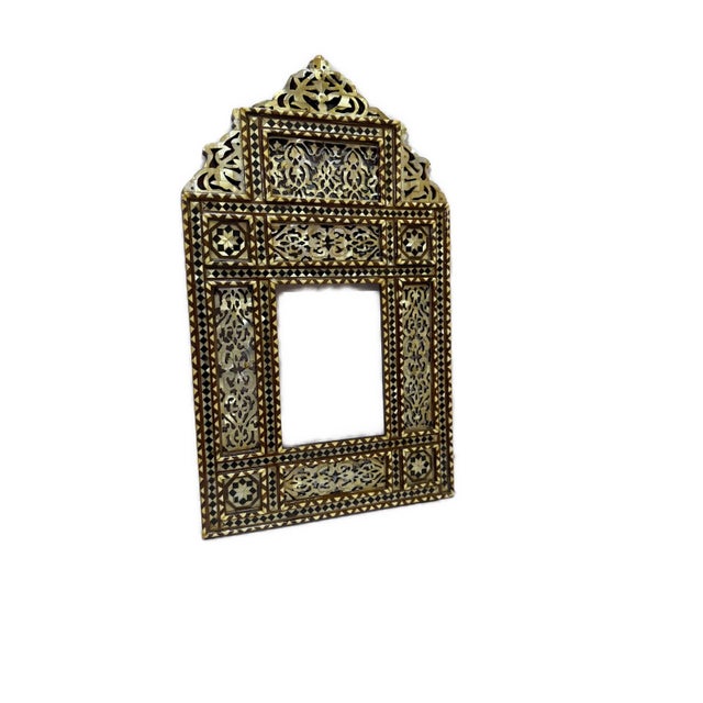 This authentic handmade mirror frame is decorated with genuine mother-of-pearl (sadaf) inlay and traditional Arabic...