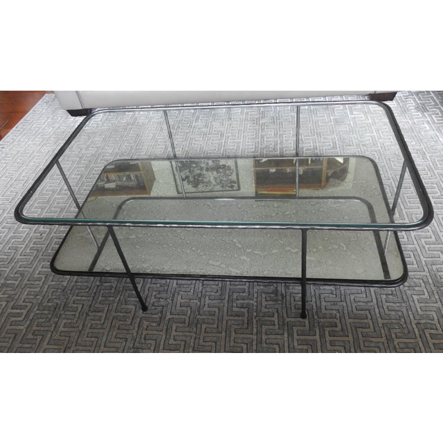 2021 discontinued Williams Sonoma Marley foxed mirror, black iron coffee table. 44"X24"16"H. Heavy. Removable glass on the...