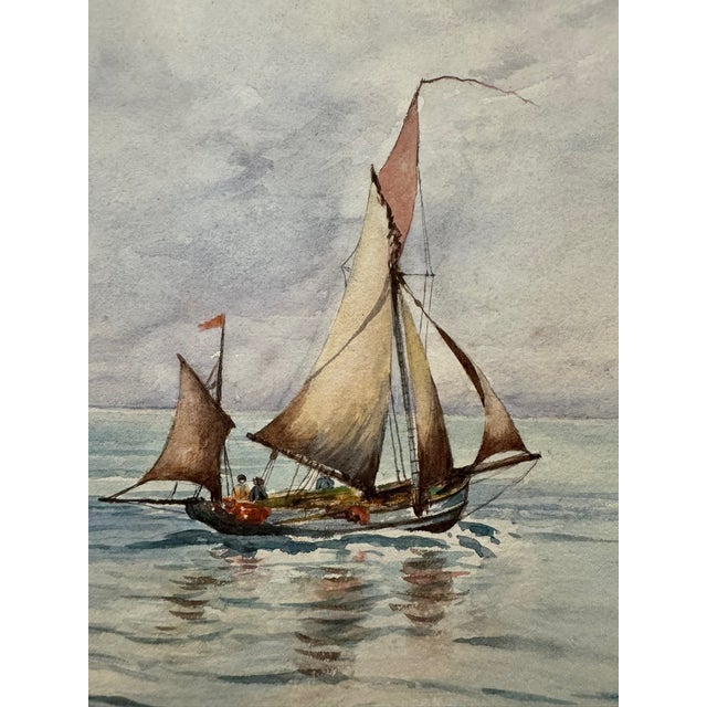 Original watercolor on paper depicting a traditional sailing vessel underway on calm open water beneath an expansive...